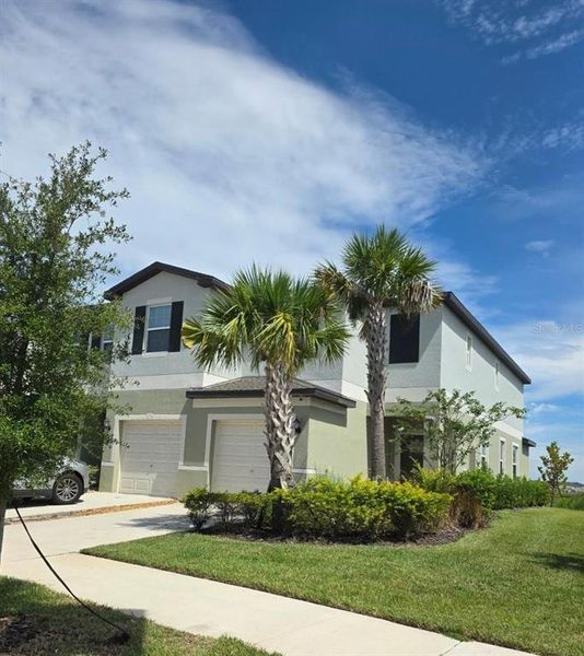 Front exterior of a new home in , San Antonio, FL, highlighting curb appeal (Image 2).