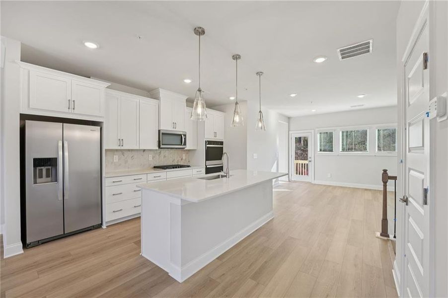 Furnished interior view inside a new home in Hemingway - Highland Series, Cumming (Image 18).