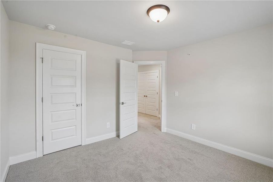 Spacious, unfurnished interior of a new home in Hemingway - Highland Series, Cumming (Image 29). Spacious, unfurnished interior of a new home in Hemingway - Highland Series, Cumming (Image 29).