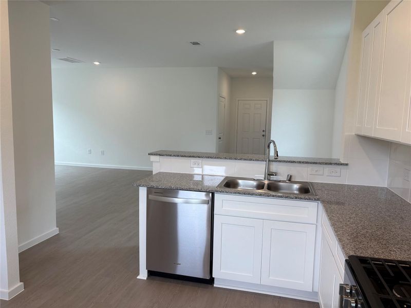 Furnished interior view inside a new home in Decker Farms, Magnolia (Image 4).