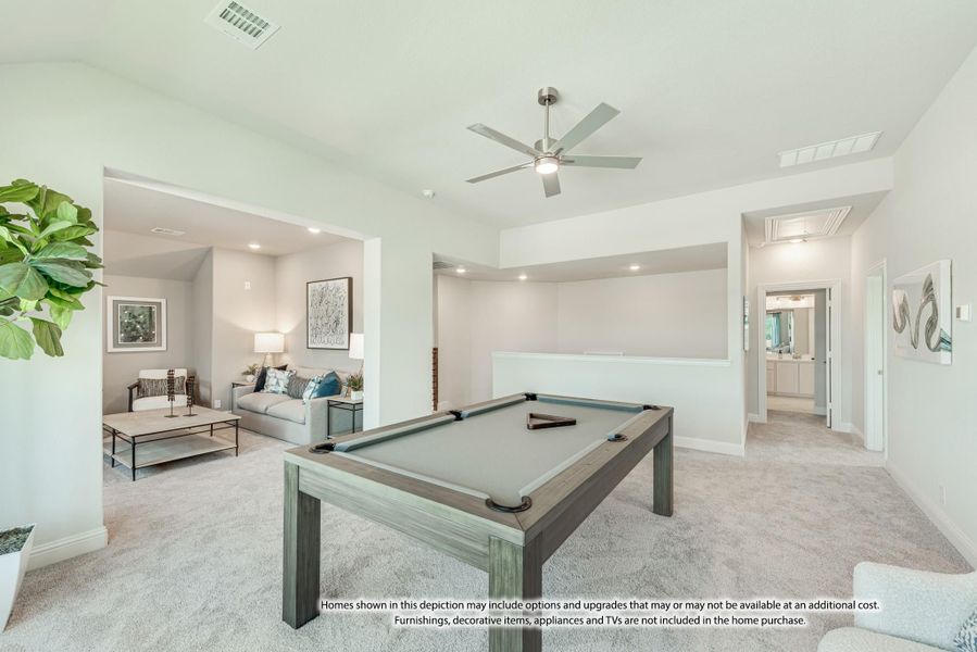 Game room with pool table, ceiling fan, and carpet, open to sitting area beyond Game room with pool table, ceiling fan, and carpet, open to sitting area beyond