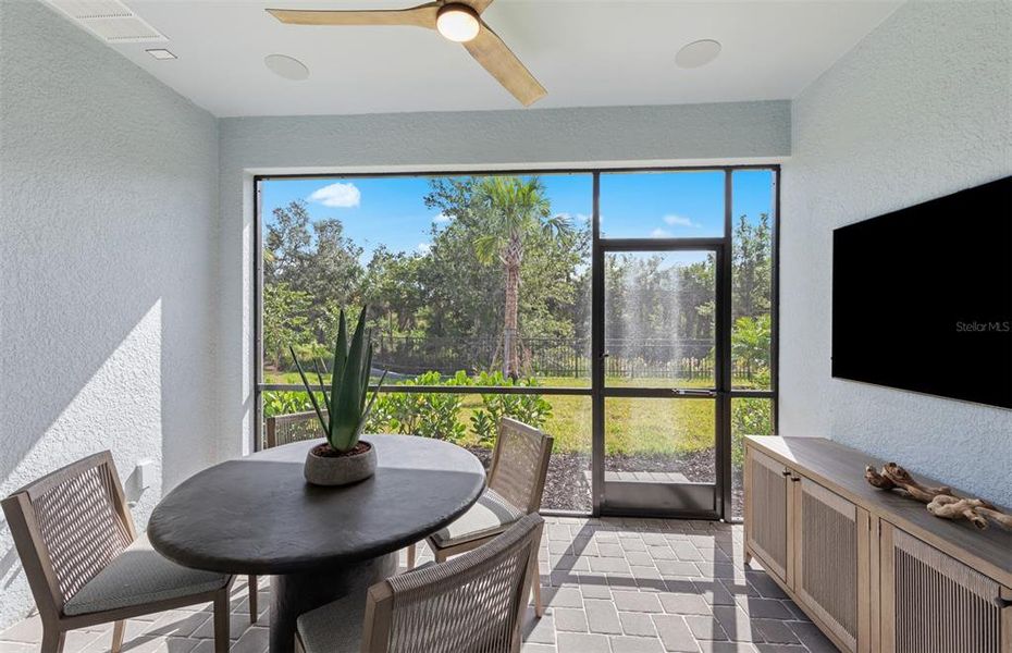Exterior details and patio area of a home in Shores at Stillwater, Englewood (Image 3).