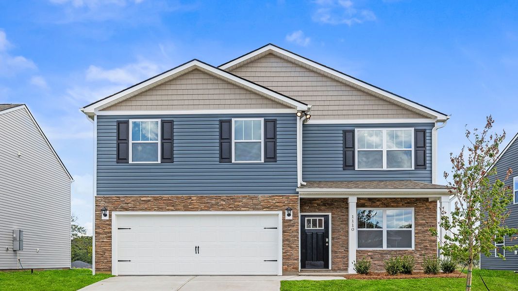 Front exterior of a new home in Woodhaven, Spartanburg, SC, highlighting curb appeal (Image 1). Front exterior of a new home in Woodhaven, Spartanburg, SC, highlighting curb appeal (Image 1).