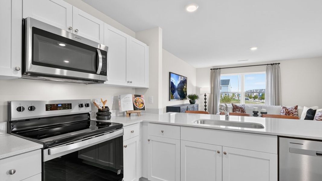 Representative furnished interior of a home built from the Pearson by D.R. Horton in Battle Crossings, Raleigh (Image 6).