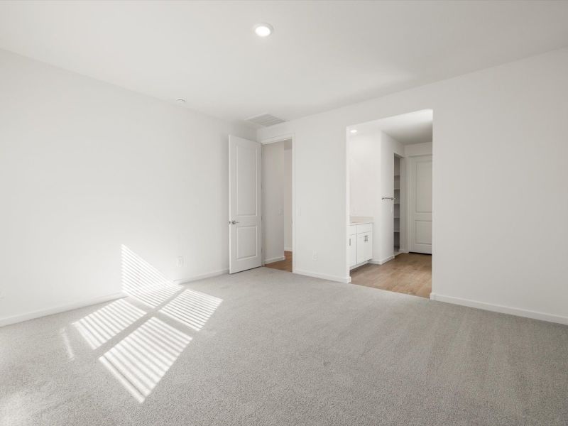 Spacious, unfurnished interior of a new home in Mesquite Mountain Ranch at Frontera, Surprise (Image 8).