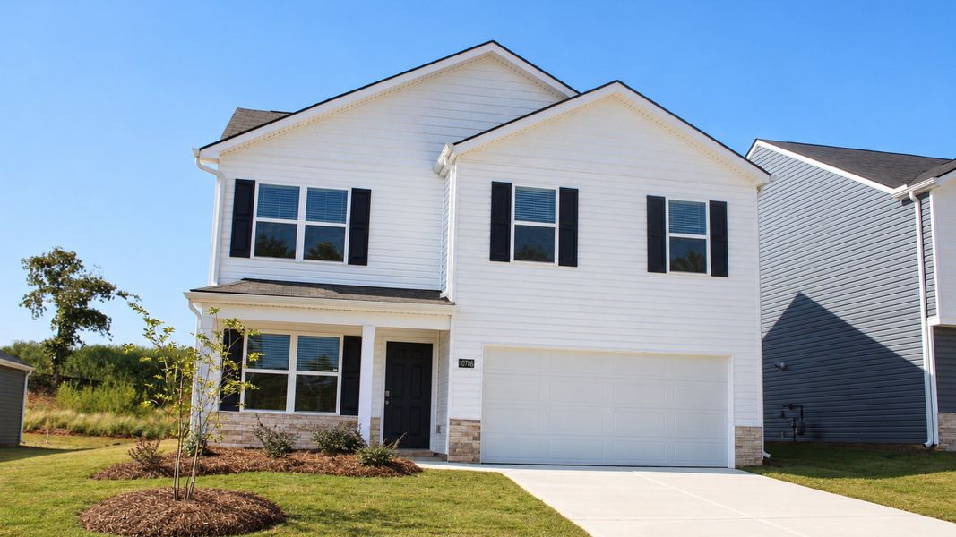 Front exterior of a new home in Prairie Pass, Apison, TN, highlighting curb appeal (Image 14).