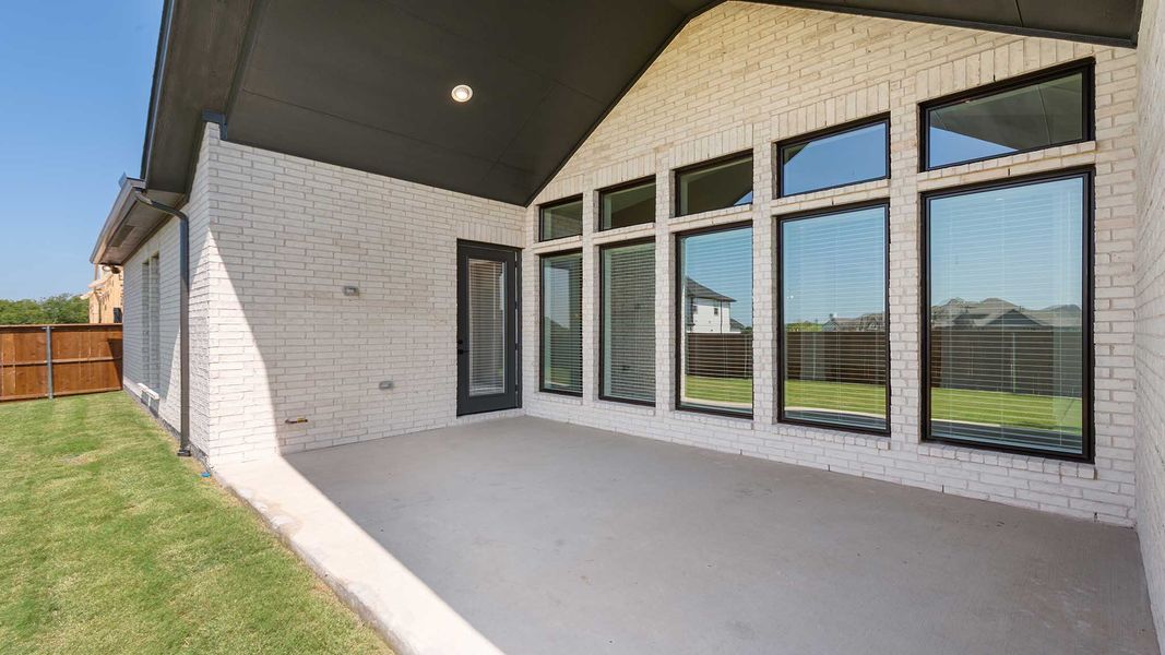 Representative exterior details of a home built from the 4411W by Perry Homes in Enchanted Creek, Allen (Image 3).