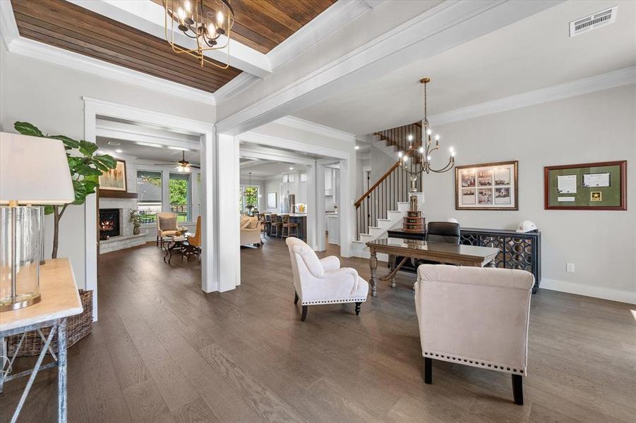 WOW! Open concept is accented by wood flooring & ceilings as you enter the home!