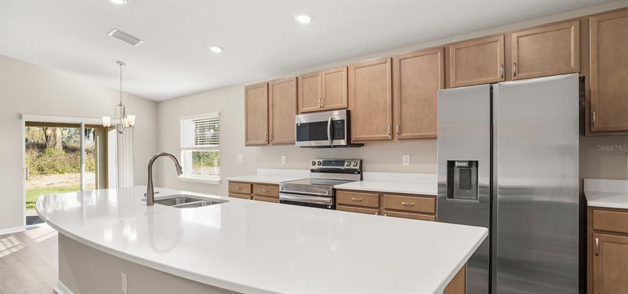 Furnished interior view inside a new home in Bennah Oaks, Belleview (Image 7).