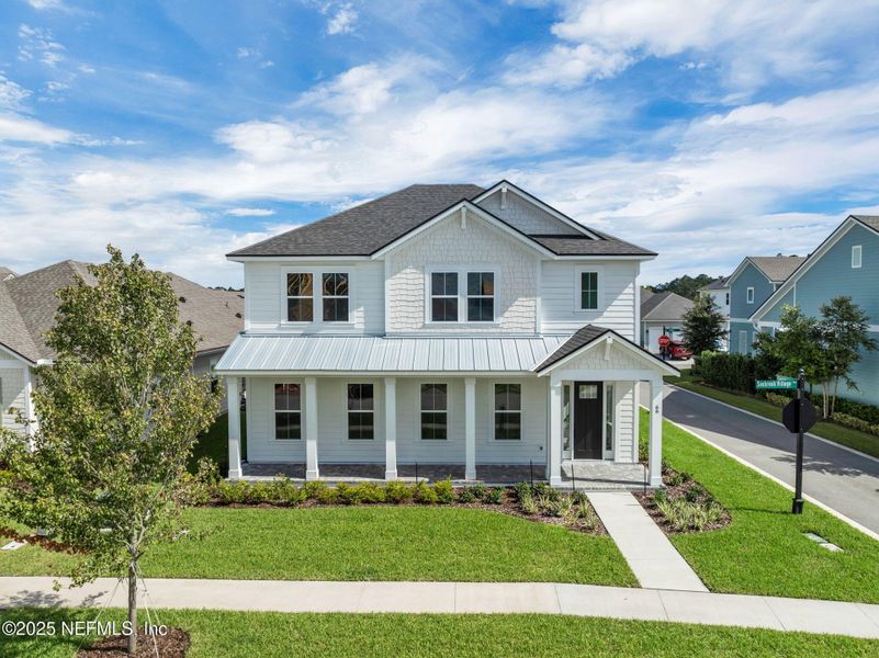 Front exterior of a new home in Seabrook Village at Seabrook, Nocatee, FL, highlighting curb appeal (Image 24). Front exterior of a new home in Seabrook Village at Seabrook, Nocatee, FL, highlighting curb appeal (Image 24).