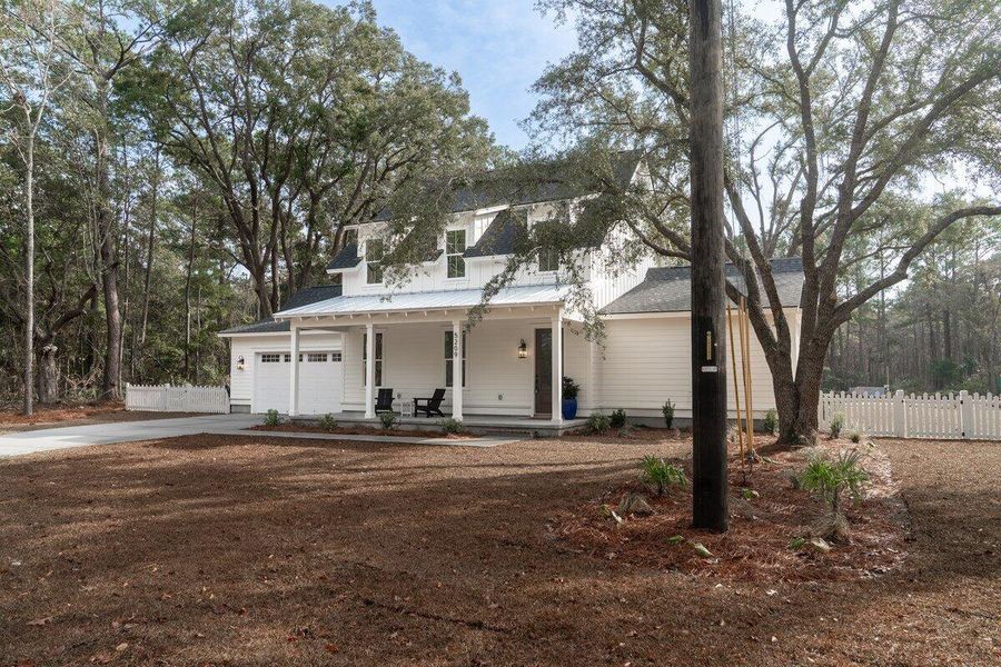 Front exterior of a new home in , Awendaw, SC, highlighting curb appeal (Image 25).