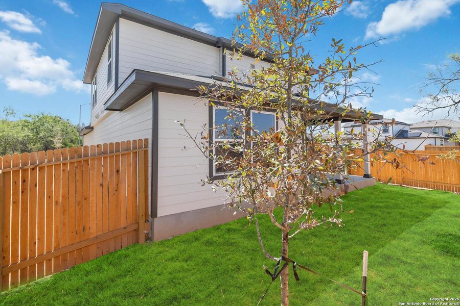 Front exterior of a new home in Applewhite Meadows, San Antonio, TX, highlighting curb appeal (Image 16).