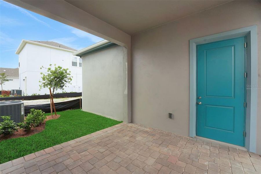 Exterior details and patio area of a home in Laureate Park (Craft Homes), Orlando (Image 3).
