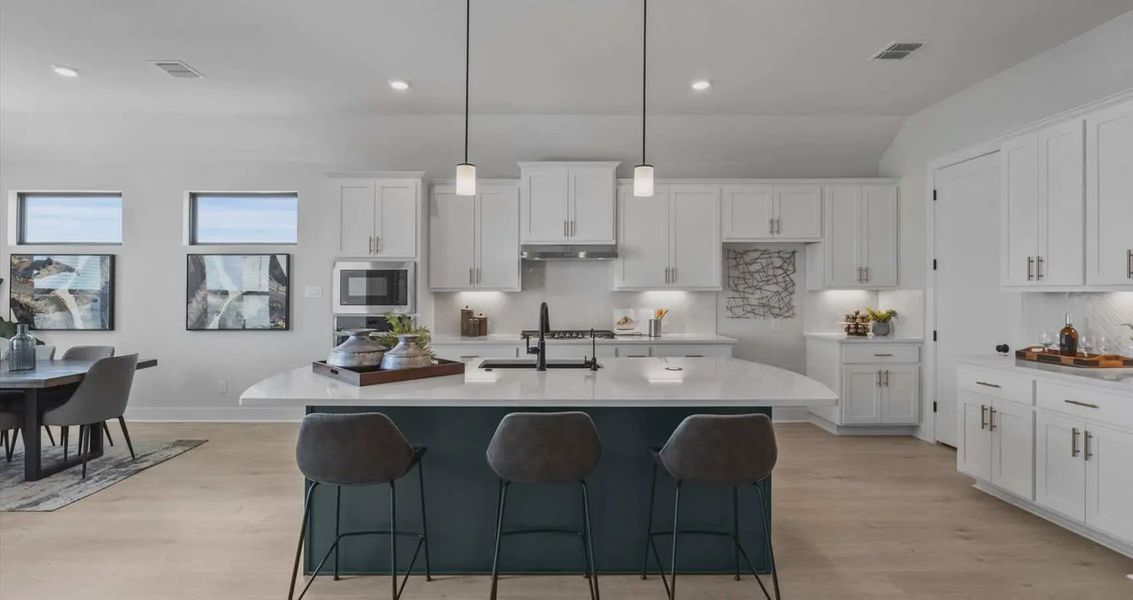 Representative furnished interior of a home built from the Bryant by Chesmar Homes in Sunfield, Buda (Image 6). Representative furnished interior of a home built from the Bryant by Chesmar Homes in Sunfield, Buda (Image 6).