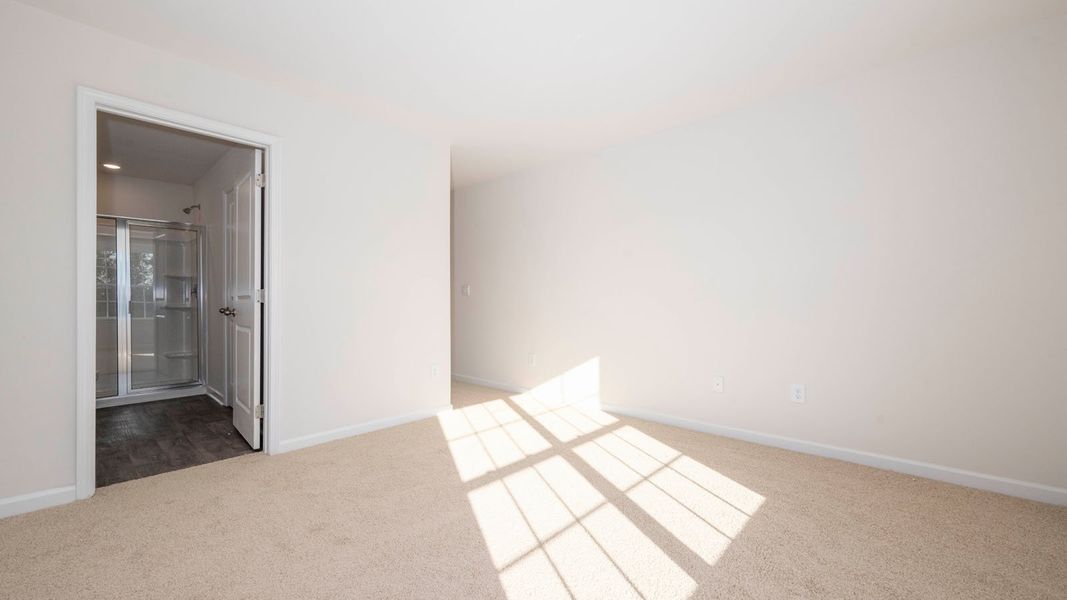 Spacious, unfurnished interior of a new home in North Village Townes, Greensboro (Image 20).