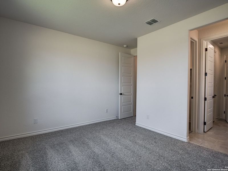 Spacious, unfurnished interior of a new home in The Reserve at Potranco Oaks, Castroville (Image 42).