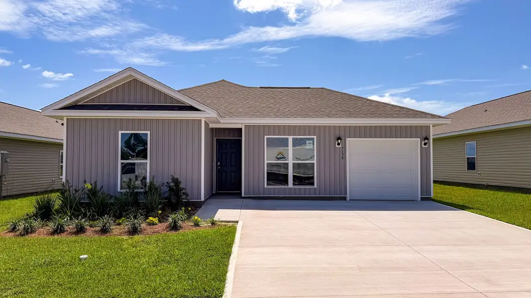 Front exterior of a new home in Liberty, Panama City, FL, highlighting curb appeal (Image 1). Front exterior of a new home in Liberty, Panama City, FL, highlighting curb appeal (Image 1).