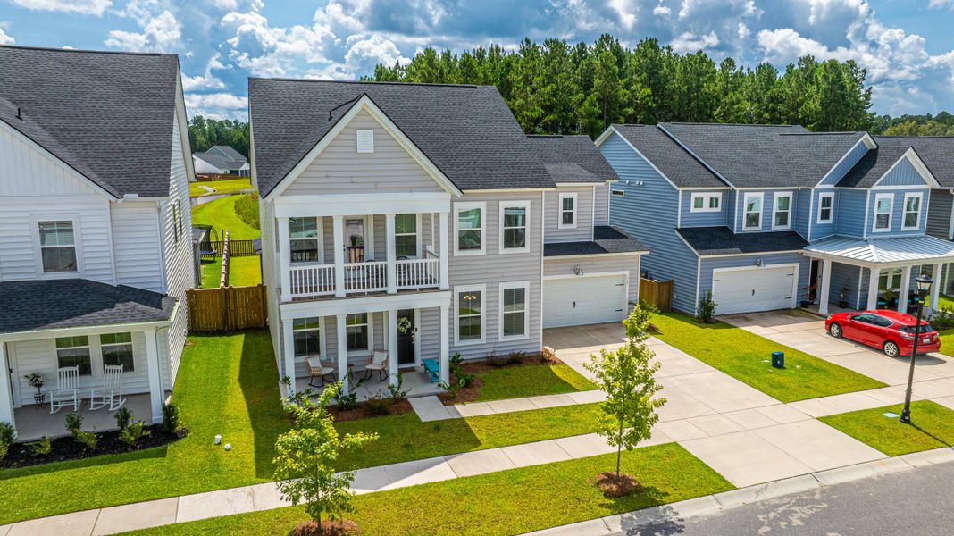 Front exterior of a new home in Heron's Walk at Summers Corner: Coastal Collection, Summerville, SC, highlighting curb appeal (Image 2).