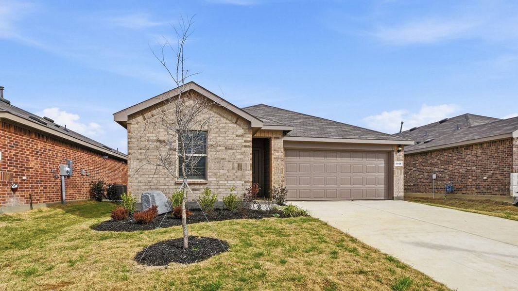 Representative exterior photo of a completed home built from the Caden by D.R. Horton in Hickory Grove, Krum, TX (Image 26).