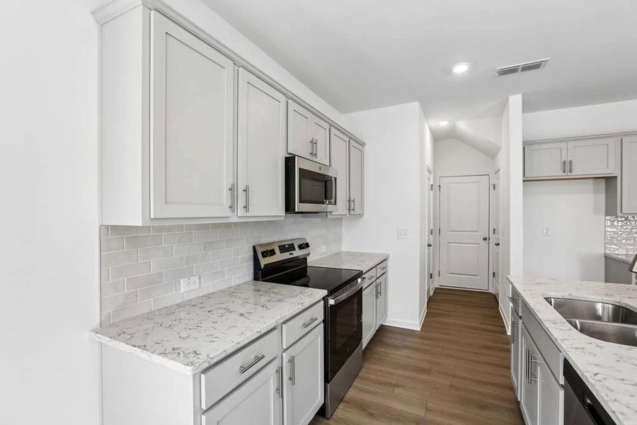 Kitchen featuring Milan Collection Finishes