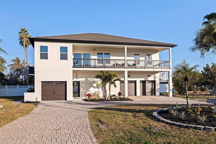 Front exterior of a new home in , Treasure Island, FL, highlighting curb appeal (Image 2). Front exterior of a new home in , Treasure Island, FL, highlighting curb appeal (Image 2).