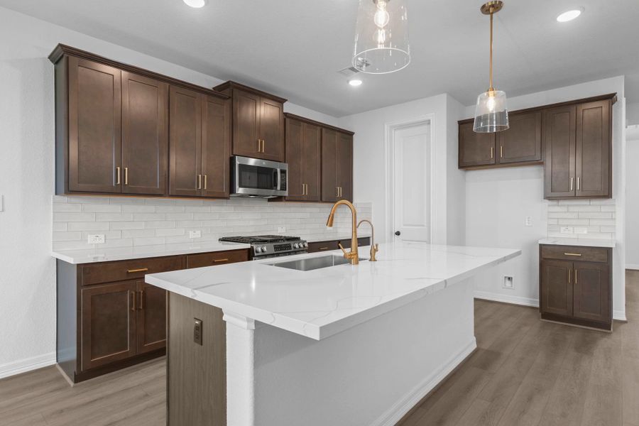 Kitchen. Sample product photo. Actual exterior and interior selections may vary by homesite. Photo may be virtually staged. Kitchen. Sample product photo. Actual exterior and interior selections may vary by homesite. Photo may be virtually staged.