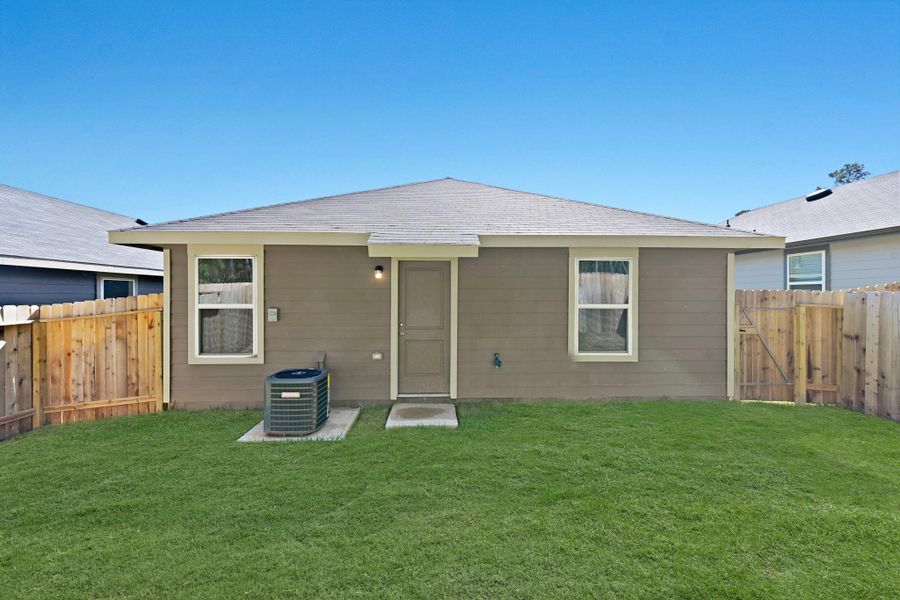 Exterior details and patio area of a home in , Conroe (Image 14).