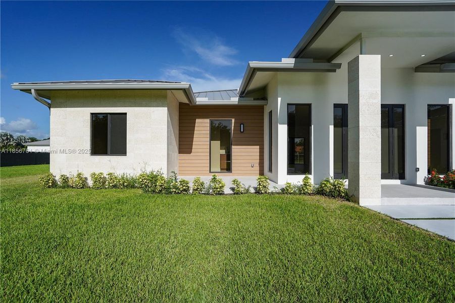 Front exterior of a new home in , Homestead, FL, highlighting curb appeal (Image 33).