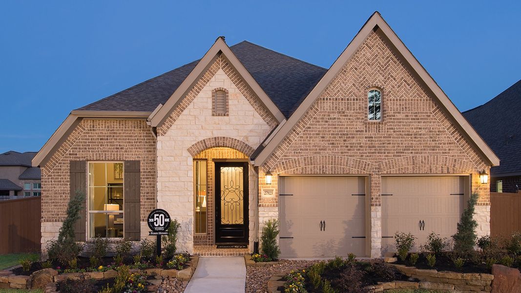 Representative exterior photo of a completed home built from the 2529W by Perry Homes in Santa Rita Ranch - Eldorado, Liberty Hill, TX (Image 26). Representative exterior photo of a completed home built from the 2529W by Perry Homes in Santa Rita Ranch - Eldorado, Liberty Hill, TX (Image 26).