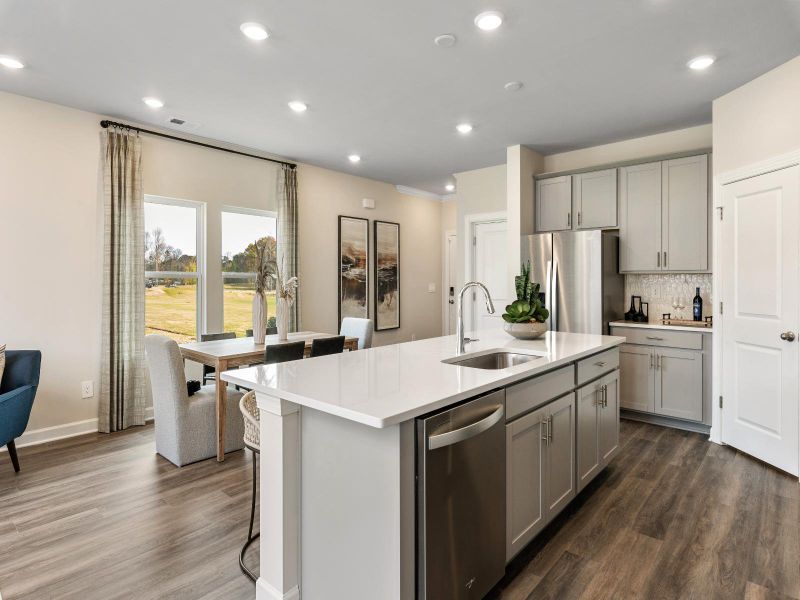 Prep meals or spend time with friends at your beautiful kitchen island.