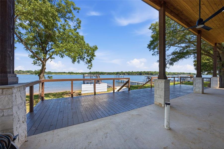 Huge covered patio runs the entire rear of the home.