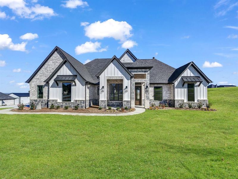 Front exterior of a new home in , Weatherford, TX, highlighting curb appeal (Image 28).