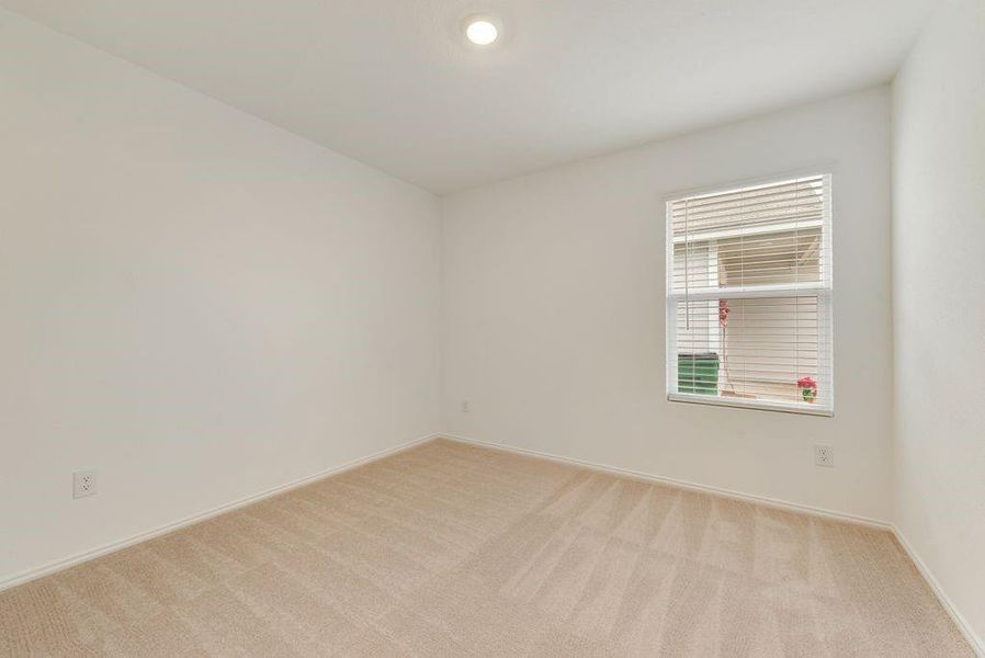 Unfurnished room featuring recessed lighting, light carpet, and baseboards