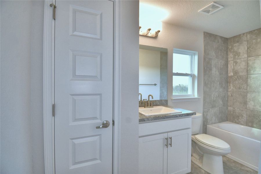 Furnished interior view inside a new home in Cadence Crossing, Auburndale (Image 12).