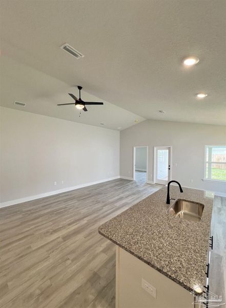 Spacious, unfurnished interior of a new home in Pine Top, Cantonment (Image 6).