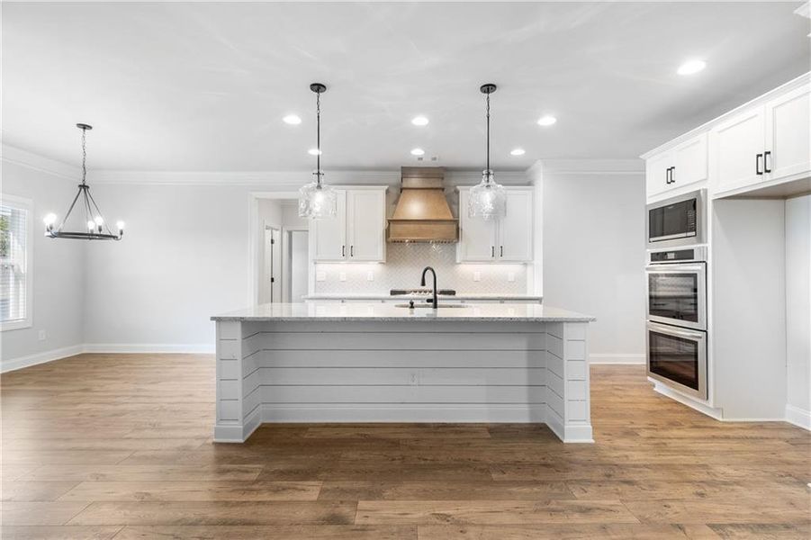 Furnished interior view inside a new home in Calgary Downs, Winder (Image 5).