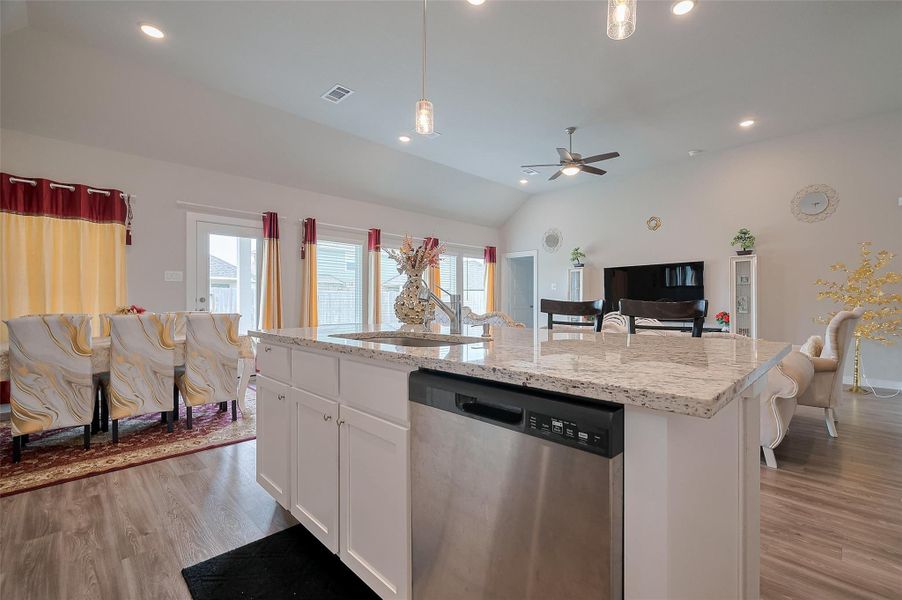 Open-concept kitchen and living area.