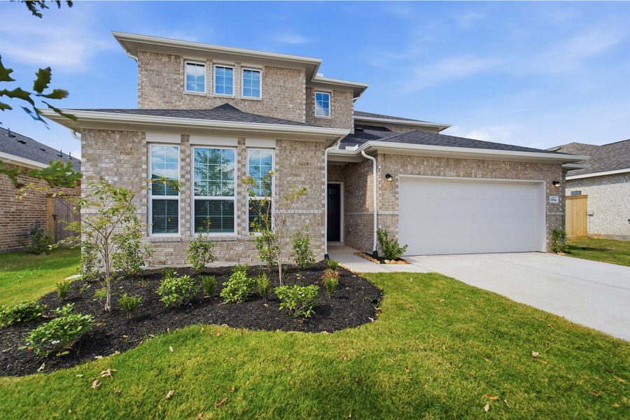 Front exterior of a new home in Ashland, Richwood, TX, highlighting curb appeal (Image 27). Front exterior of a new home in Ashland, Richwood, TX, highlighting curb appeal (Image 27).