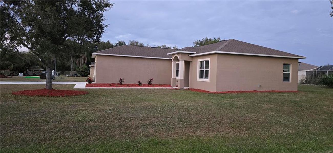 Exterior details and patio area of a home in , Sebring (Image 3).