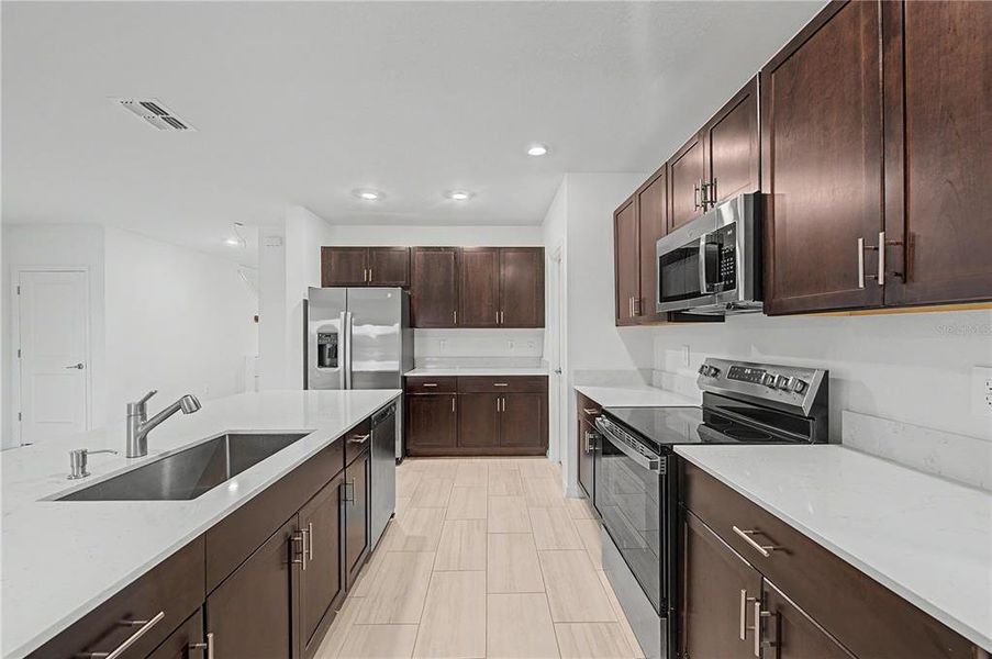 Furnished interior view inside a new home in Park East, Plant City (Image 13).