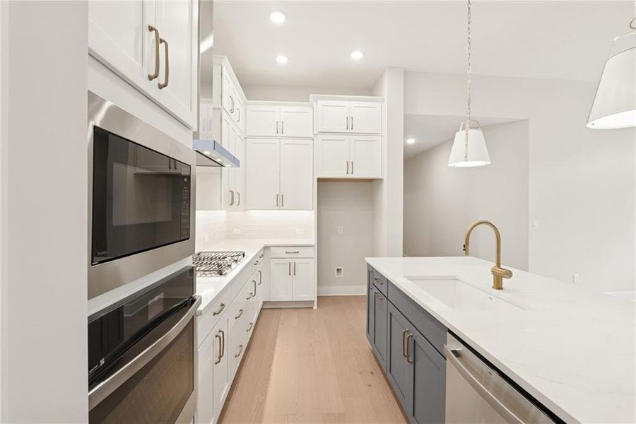 Furnished interior view inside a new home in Maple Grove at Towne Lake, Woodstock (Image 6).