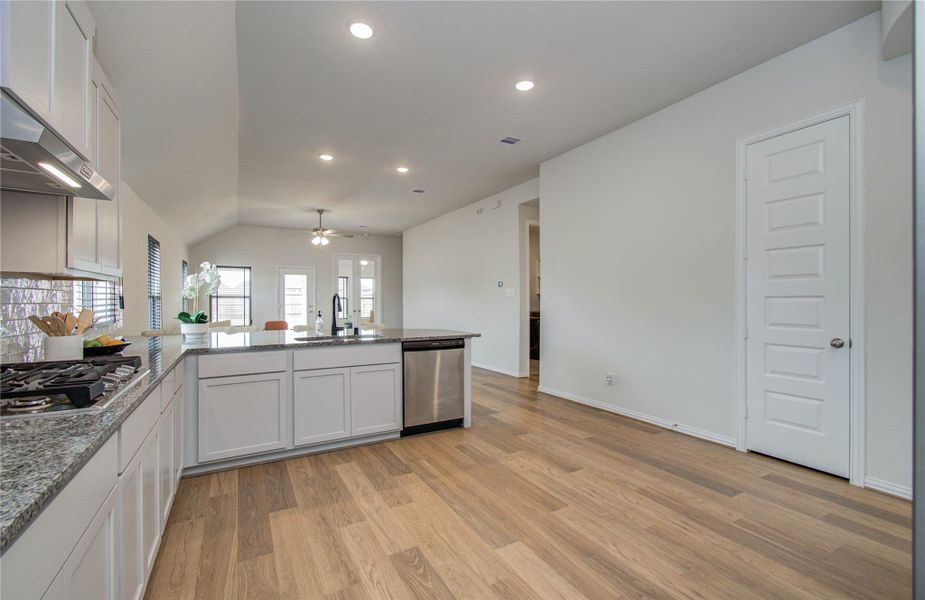 Furnished interior view inside a new home in Sunterra, Katy (Image 7).