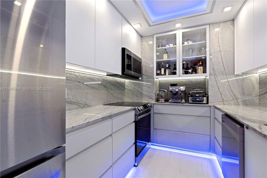 Furnished interior view inside a new home in , Sunny Isles Beach (Image 12). Furnished interior view inside a new home in , Sunny Isles Beach (Image 12).