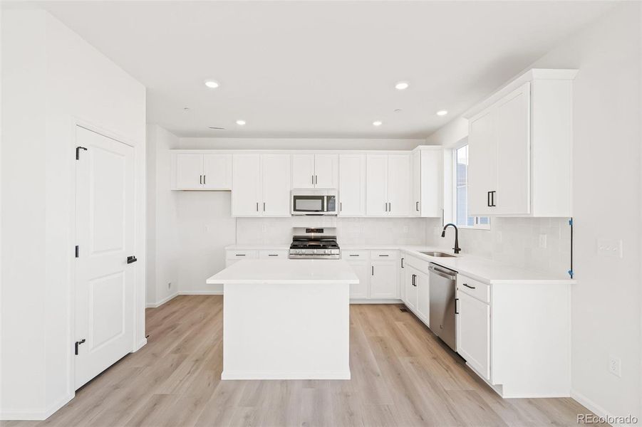 Furnished interior view inside a new home in The Nest Classic at Canyon Creek, Erie (Image 13).