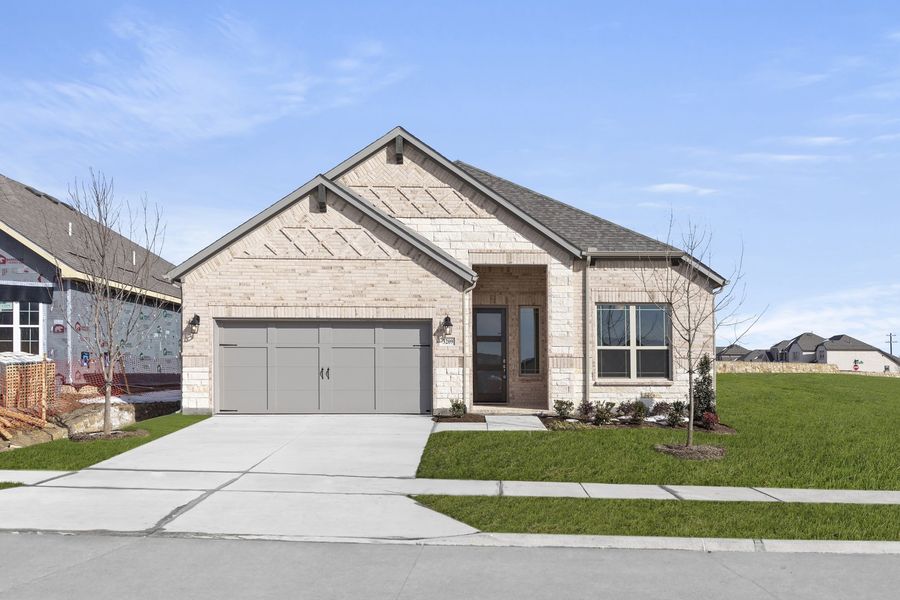 Front exterior of a new home in Brookshire at Legacy Hills, Celina, TX, highlighting curb appeal (Image 1). Front exterior of a new home in Brookshire at Legacy Hills, Celina, TX, highlighting curb appeal (Image 1).