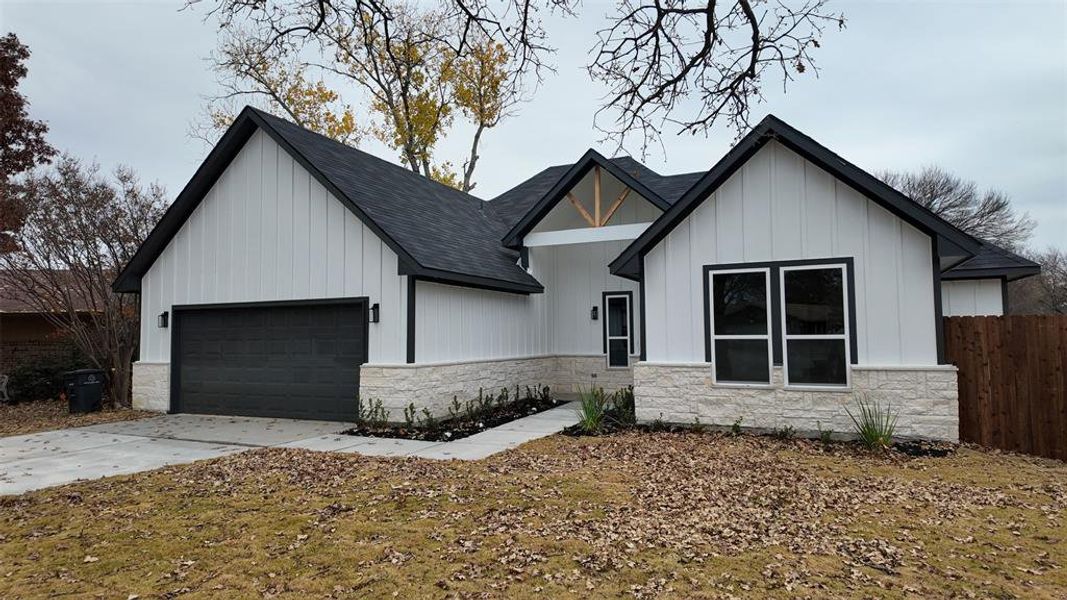 Front exterior of a new home in , Lewisville, TX, highlighting curb appeal (Image 18). Front exterior of a new home in , Lewisville, TX, highlighting curb appeal (Image 18).