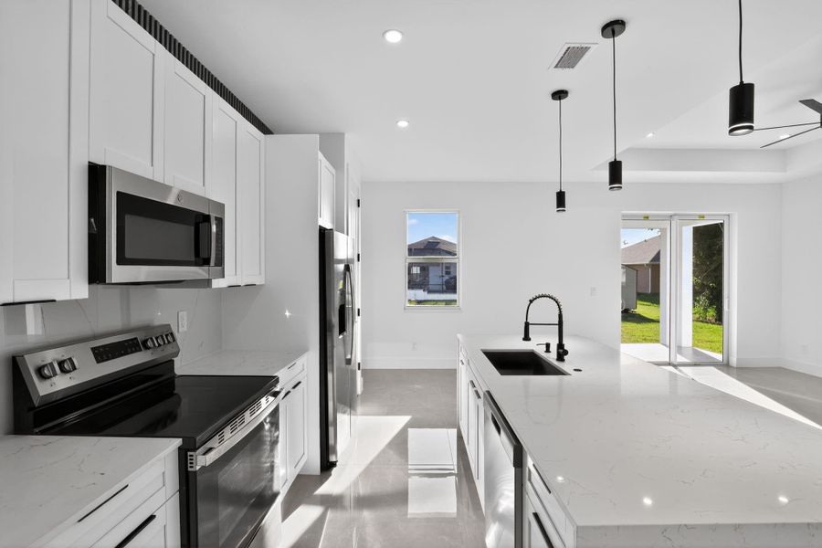 Furnished interior view inside a new home in , Cape Coral (Image 2). Furnished interior view inside a new home in , Cape Coral (Image 2).