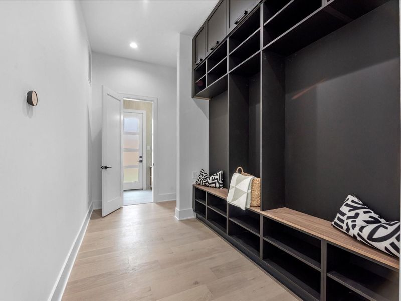 Very handy boot-room - handy spot to store your items for the following day. Located by the 2 car garage, complete with Epoxy flooring and 220V EV Charger.