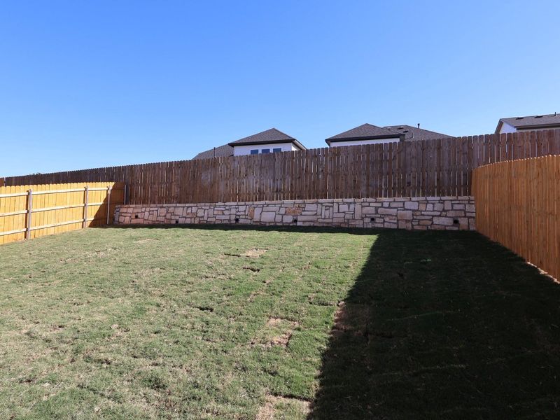 Exterior details and patio area of a home in Cedar Brook, Leander (Image 15). Exterior details and patio area of a home in Cedar Brook, Leander (Image 15).