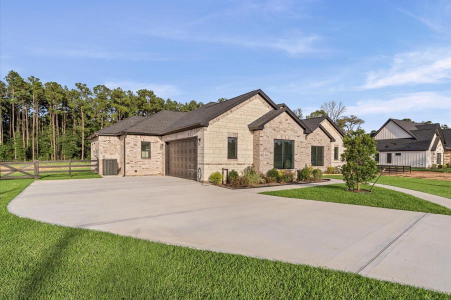 Surrounded by tall pines and country charm, this property offers space, serenity, and timeless style. Surrounded by tall pines and country charm, this property offers space, serenity, and timeless style.